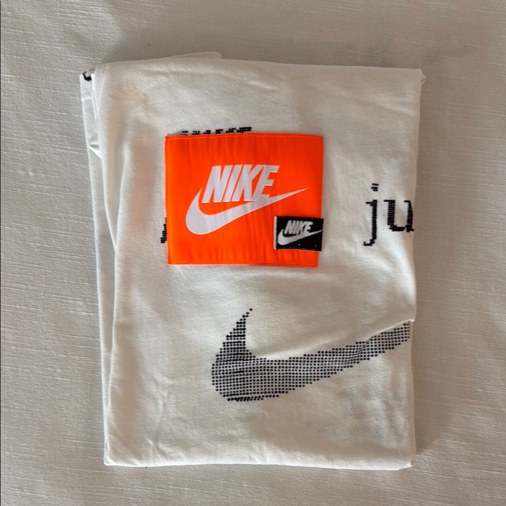 Nike White T-Shirt with Black Graphic and Orange Tag